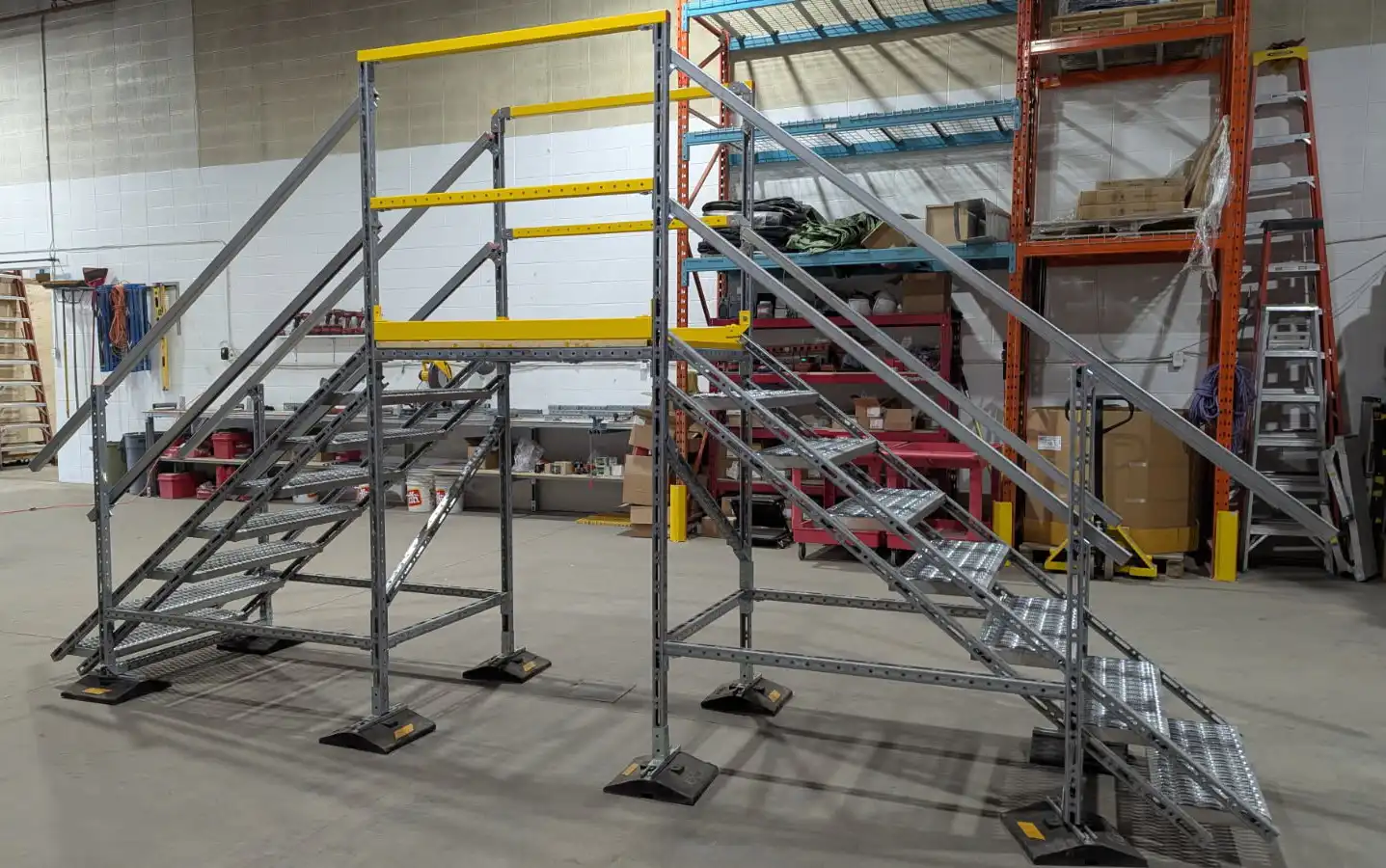 Mechano Max powder-coated handrail with toe kick on industrial work platform
