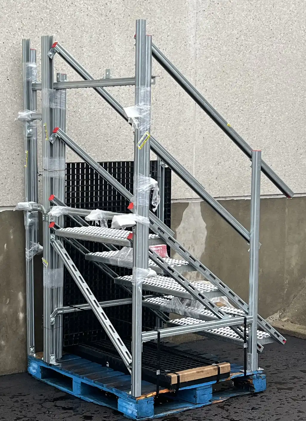 Prefab outdoor stair kit palletized and ready to ship across Canada from the Mechano Max shop in Calgary